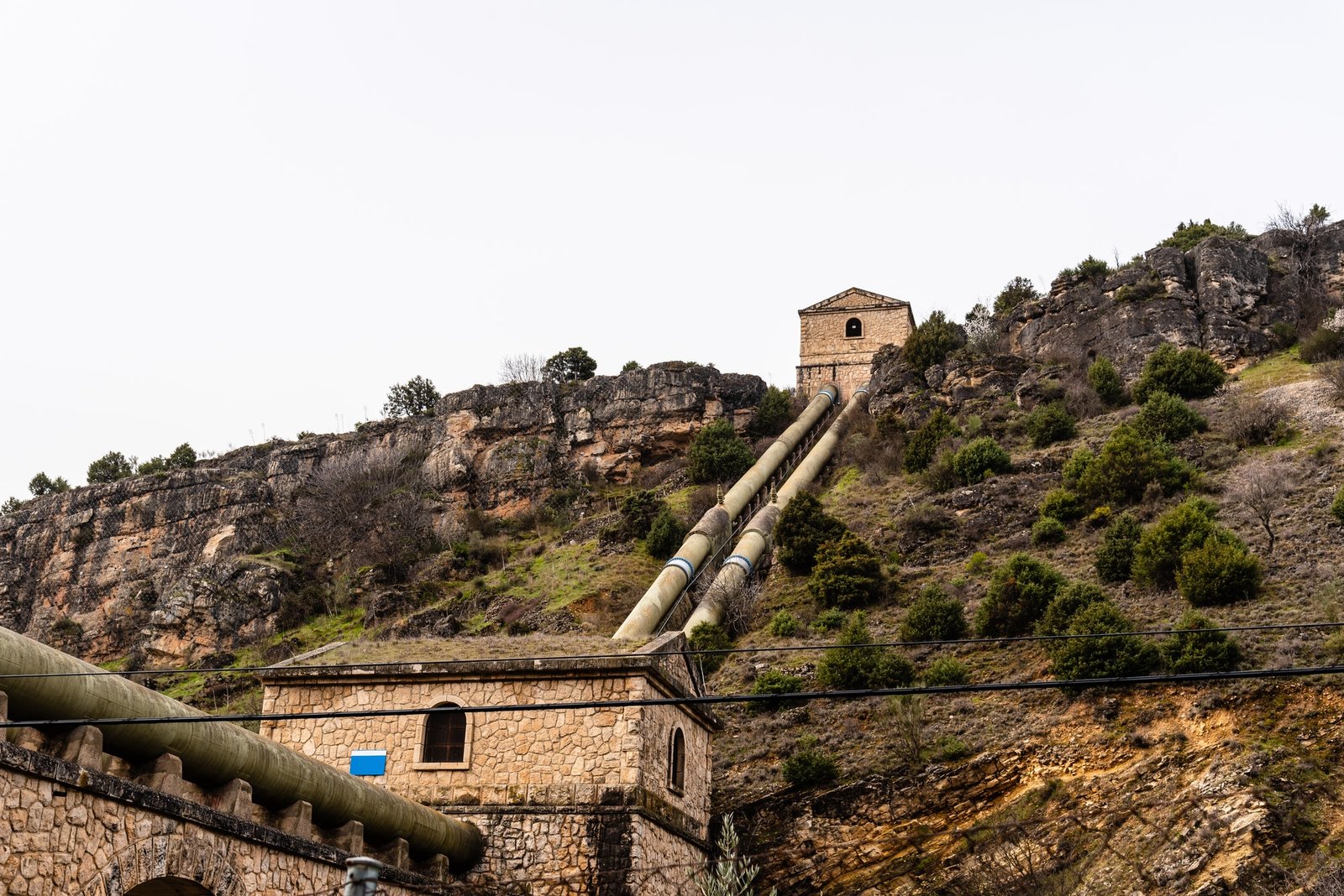 Water pipeline in the mountain with pumping station